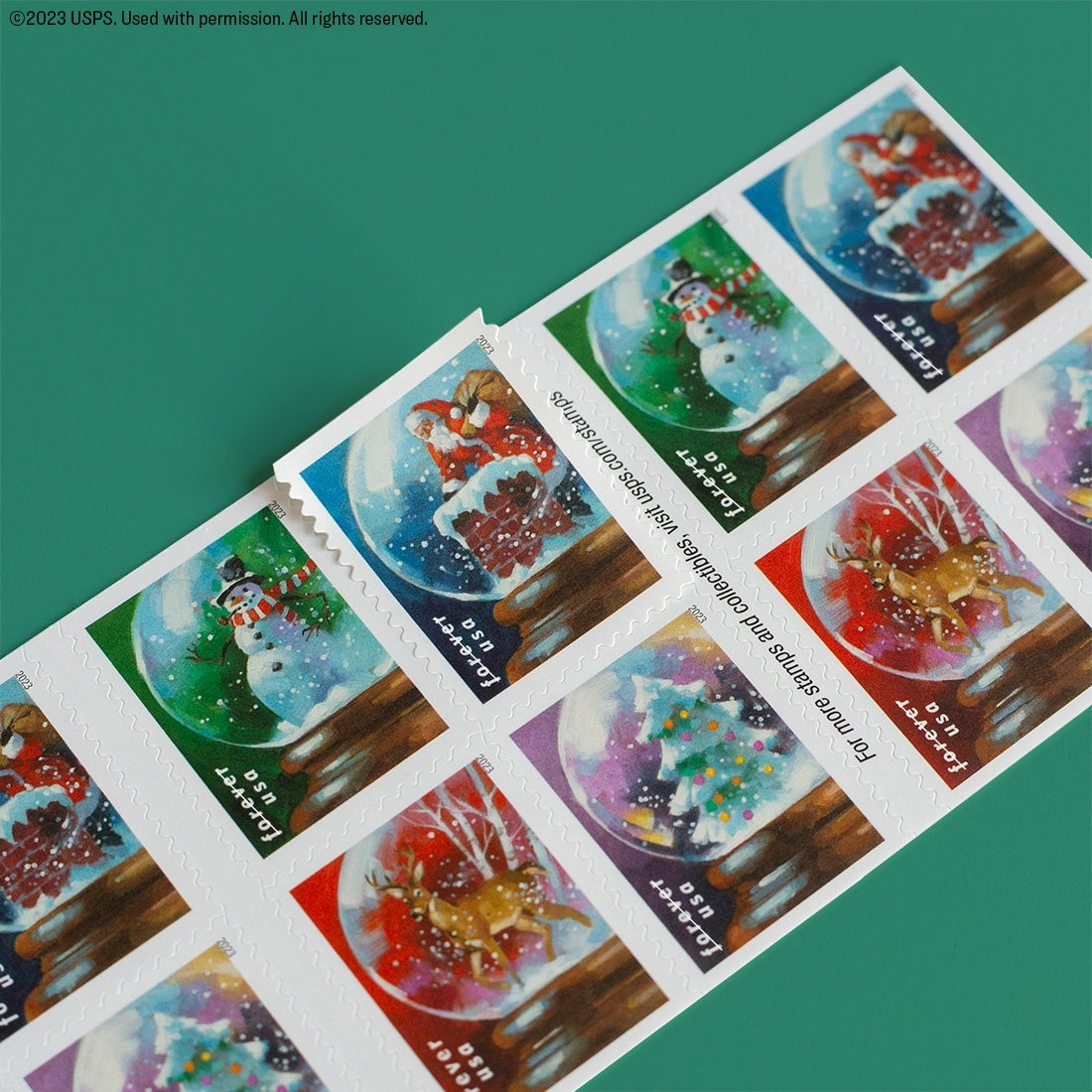 100-Books (Sealed) USPS Snow Globes Forever Postage Stamps (A snowman, Santa Claus poised on a chimney, a majestic deer and a Christmas tree)